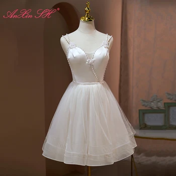 AnXin SH princese baltās rozes ziedu satīna mežģīnes spageti siksnas līgava puse frēzēšana pērles īsā vakara kleita maz balto kleitu